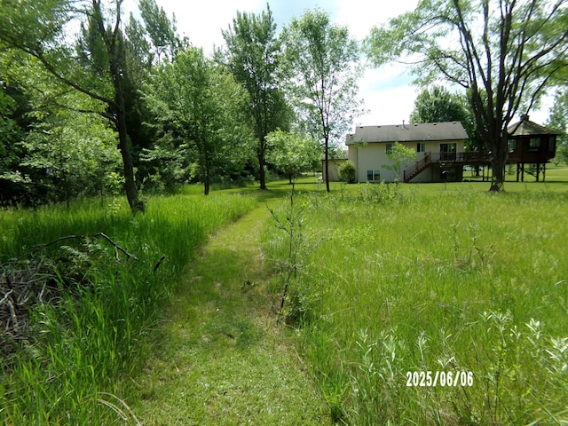 1541 282nd Ln NW, Isanti Twp, MN 55040 - view of yard with stairs and a wooden deck
