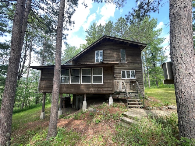 31519 243rd Ave, Moose Creek Twp, MN 56676 - back of property with a deck and stairs