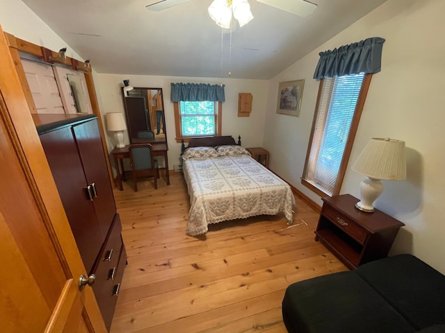 31519 243rd Ave, Moose Creek Twp, MN 56676 - bedroom featuring light wood-style floors, lofted ceiling, and ceiling fan