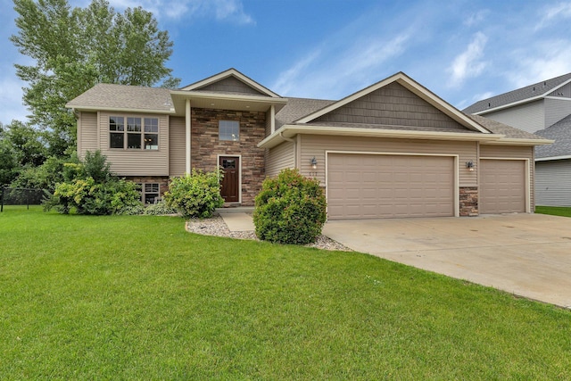 617 Knights Ct, Sartell, MN 56377 - view of front of property with stone siding, an attached garage, concrete driveway, and a front yard