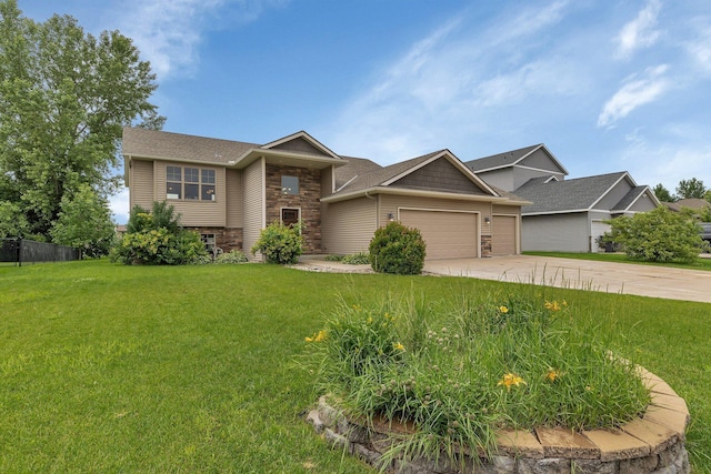617 Knights Ct, Sartell, MN 56377 - view of front of home featuring stone siding, a garage, driveway, and roof with shingles