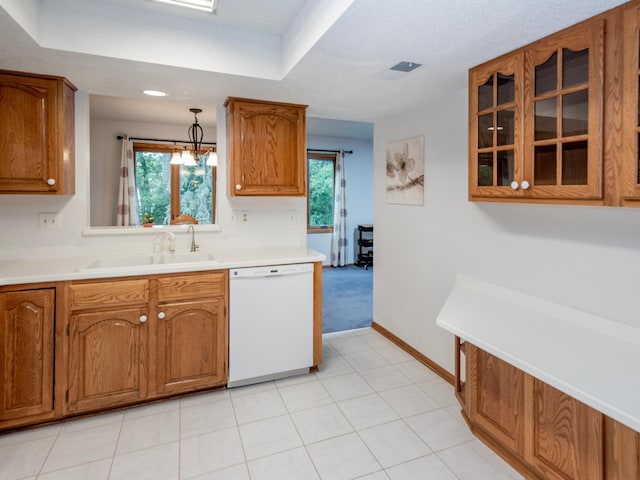 10 Windsor Ct Unit 205, New Brighton, MN 55112 - kitchen featuring white dishwasher, brown cabinetry, glass insert cabinets, plenty of natural light, and recessed lighting