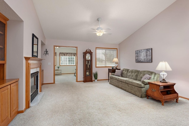 13019 Brookside Ln N, Rogers, MN 55374 - living area featuring light carpet, ceiling fan, a fireplace with flush hearth, and vaulted ceiling