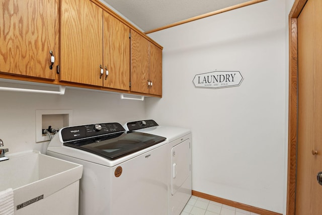 13019 Brookside Ln N, Rogers, MN 55374 - laundry room with cabinet space and washing machine and clothes dryer