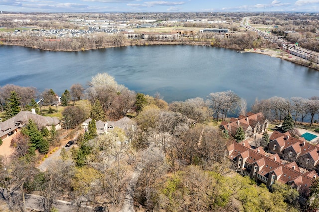 1181 12th Ave NW, New Brighton, MN 55112 - aerial view of property and surrounding area with a large body of water