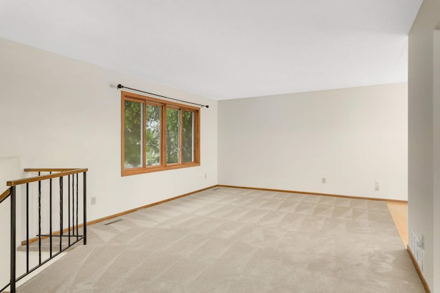 5661 Windmill Dr, White Bear Twp, MN 55110 - empty room featuring light carpet