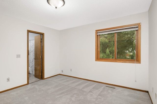 5661 Windmill Dr, White Bear Twp, MN 55110 - carpeted spare room with baseboards
