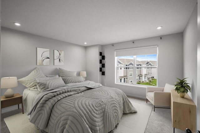 8698 London Cir NE Unit C, Blaine, MN 55449 - bedroom with light colored carpet and recessed lighting