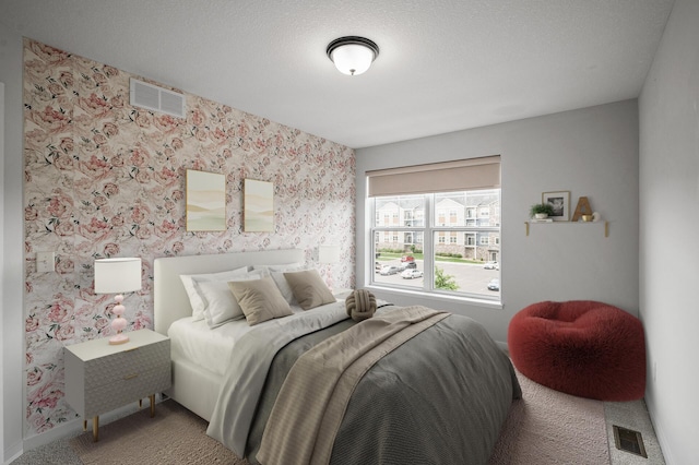 8698 London Cir NE Unit C, Blaine, MN 55449 - bedroom featuring carpet and wallpapered walls