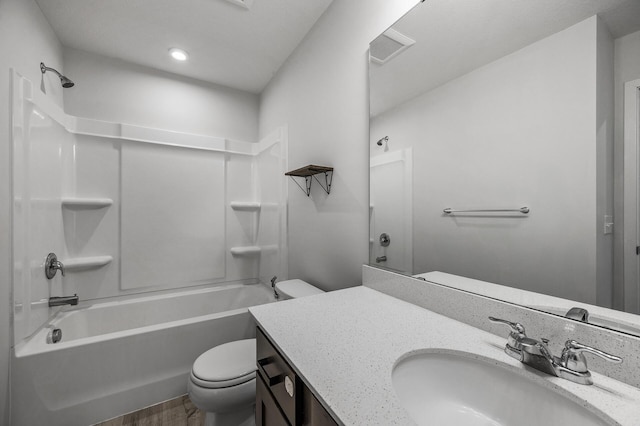 8698 London Cir NE Unit C, Blaine, MN 55449 - bathroom with vanity, bathtub / shower combination, wood finished floors, and recessed lighting