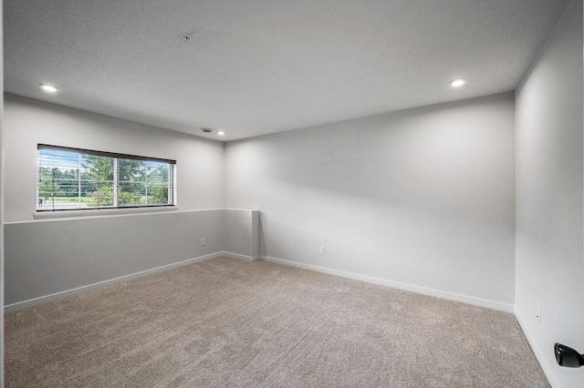 8698 London Cir NE Unit C, Blaine, MN 55449 - spare room with carpet floors, recessed lighting, and a pendent fire sprinkler