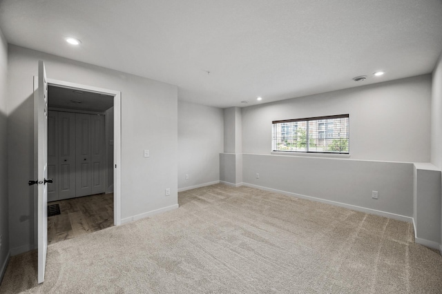 8698 London Cir NE Unit C, Blaine, MN 55449 - carpeted spare room featuring recessed lighting and baseboards