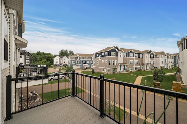 8698 London Cir NE Unit C, Blaine, MN 55449 - wooden deck featuring a residential view