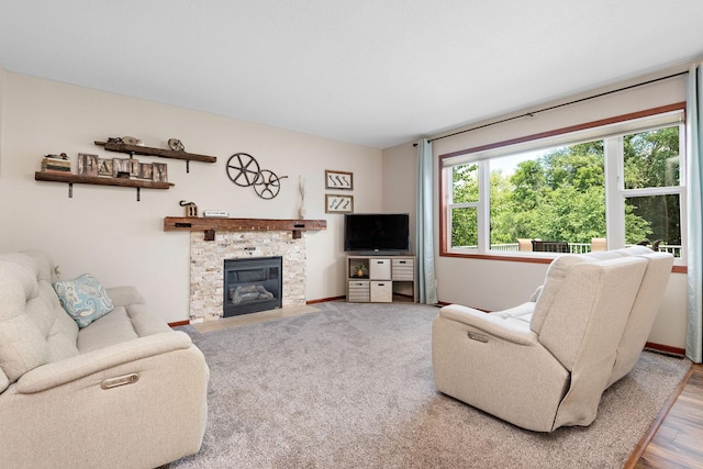 11608 21st St NE, Saint Michael, MN 55376 - living room featuring a fireplace and baseboards