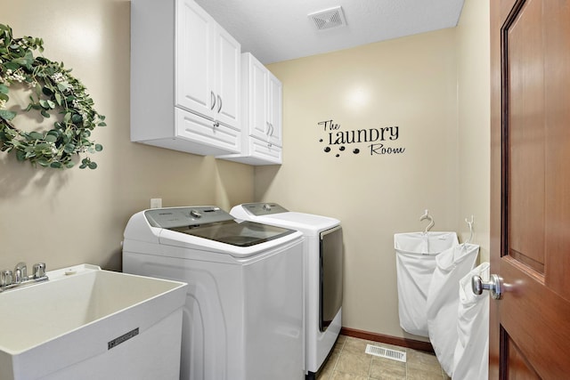 11608 21st St NE, Saint Michael, MN 55376 - laundry room with washer and dryer and cabinet space