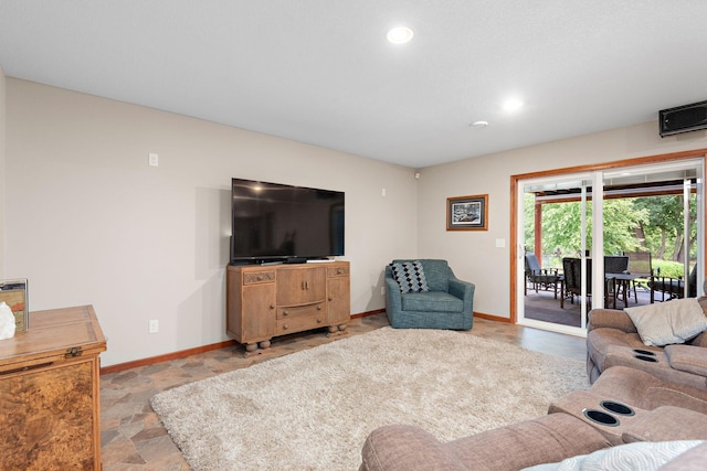 11608 21st St NE, Saint Michael, MN 55376 - living room featuring light stone finish floors and recessed lighting