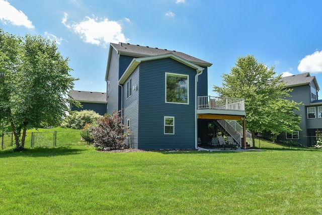 11608 21st St NE, Saint Michael, MN 55376 - back of property featuring stairs, a wooden deck, and a fenced backyard