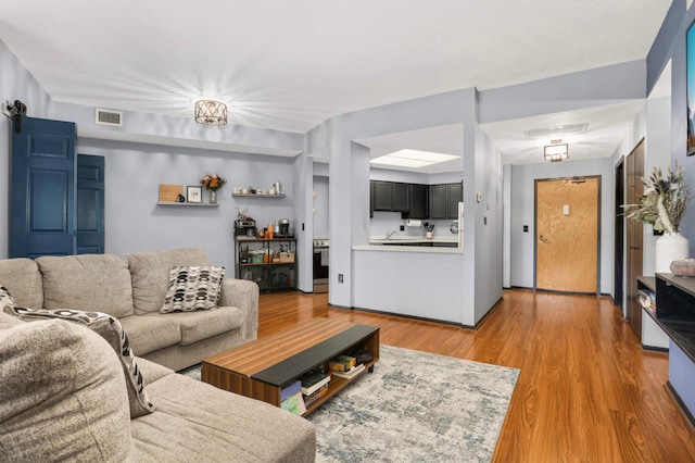 2265 Youngman Ave Unit 207E, Saint Paul, MN 55116 - living area featuring light wood-style floors