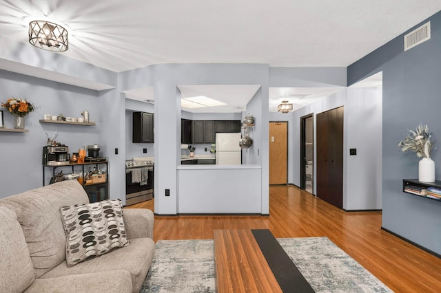 2265 Youngman Ave Unit 207E, Saint Paul, MN 55116 - living area with light wood-style flooring