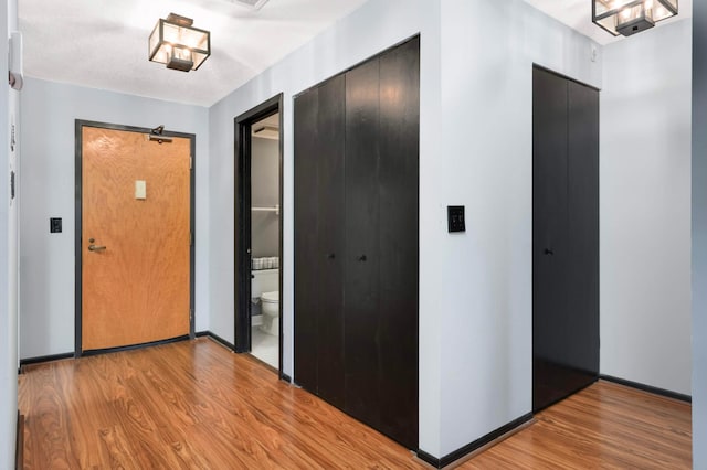 2265 Youngman Ave Unit 207E, Saint Paul, MN 55116 - entrance foyer with light wood finished floors and baseboards