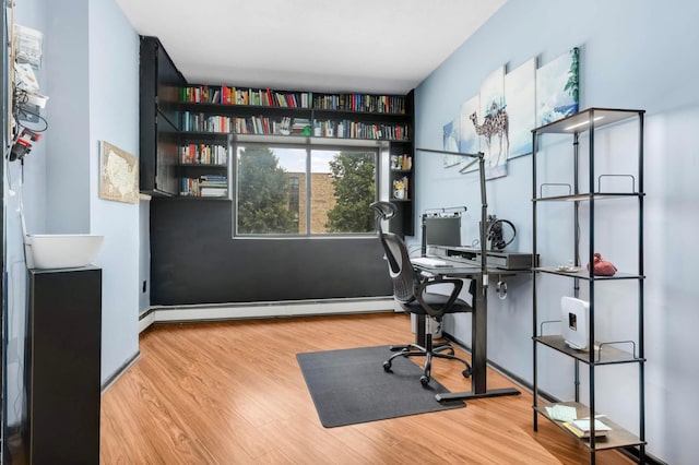 2265 Youngman Ave Unit 207E, Saint Paul, MN 55116 - office with baseboard heating and wood finished floors