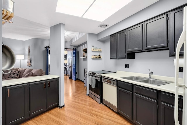 2265 Youngman Ave Unit 207E, Saint Paul, MN 55116 - kitchen featuring dishwasher, stainless steel electric range oven, light wood finished floors, light countertops, and dark cabinets