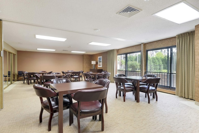 2265 Youngman Ave Unit 207E, Saint Paul, MN 55116 - dining area with light colored carpet