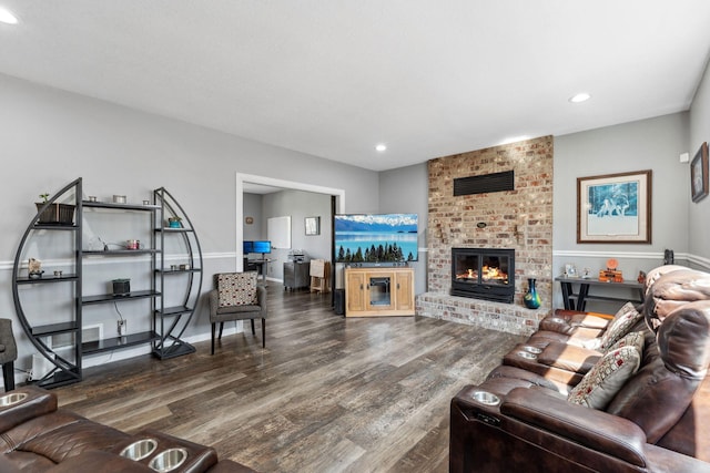 8700 Kilbirnie Ter, Brooklyn Park, MN 55443 - living area featuring wood finished floors, recessed lighting, and a fireplace