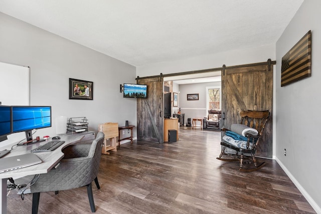 8700 Kilbirnie Ter, Brooklyn Park, MN 55443 - home office with a barn door and wood finished floors