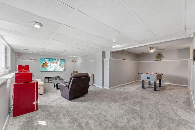 8700 Kilbirnie Ter, Brooklyn Park, MN 55443 - recreation room featuring carpet floors, a drop ceiling, and ceiling fan