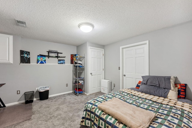 8700 Kilbirnie Ter, Brooklyn Park, MN 55443 - carpeted bedroom featuring a textured ceiling