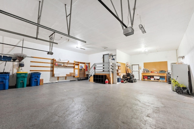 8700 Kilbirnie Ter, Brooklyn Park, MN 55443 - garage featuring a garage door opener