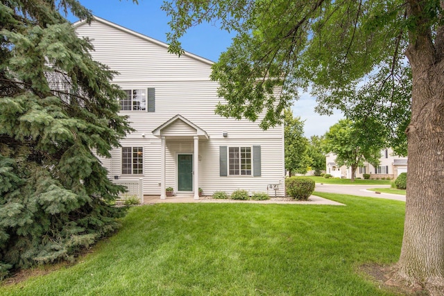 17980 69th Pl N, Maple Grove, MN 55311 - view of front of home with a front lawn