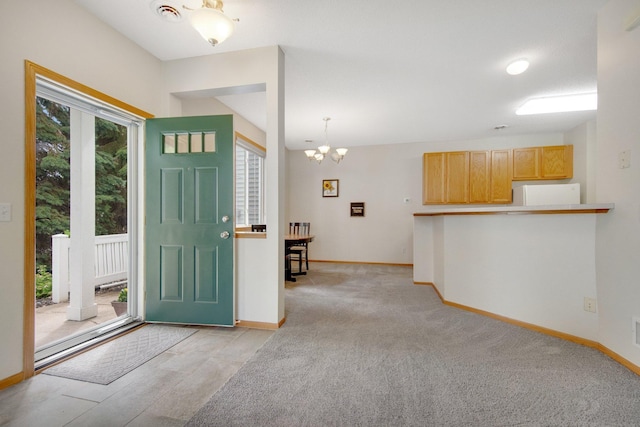 17980 69th Pl N, Maple Grove, MN 55311 - entryway featuring a chandelier and light colored carpet