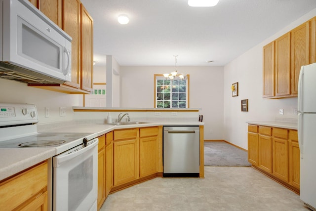 17980 69th Pl N, Maple Grove, MN 55311 - kitchen featuring white appliances, a peninsula, a chandelier, and light countertops