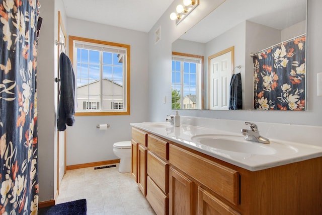 17980 69th Pl N, Maple Grove, MN 55311 - full bath with double vanity, plenty of natural light, tile patterned flooring, and curtained shower