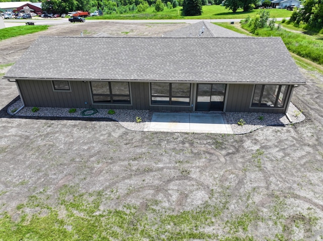 1722 41st Ave NE, Dovre Twp, MN 56201 - view of front facade with roof with shingles and board and batten siding