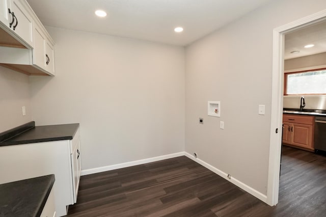 1722 41st Ave NE, Dovre Twp, MN 56201 - washroom with washer hookup, hookup for an electric dryer, dark wood finished floors, recessed lighting, and hookup for a gas dryer