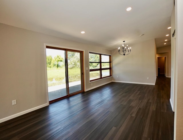 1722 41st Ave NE, Dovre Twp, MN 56201 - unfurnished room featuring a chandelier, dark wood-style flooring, and recessed lighting