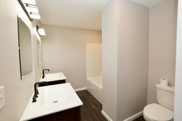 1722 41st Ave NE, Dovre Twp, MN 56201 - bathroom with wood finished floors and vanity