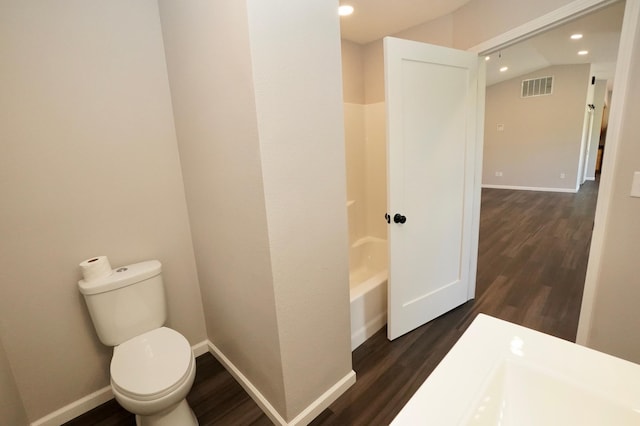 1722 41st Ave NE, Dovre Twp, MN 56201 - bathroom featuring wood finished floors, recessed lighting, and  shower combination