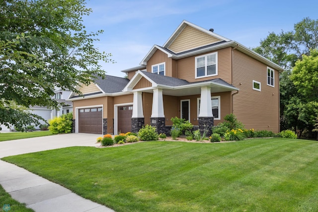 3702 Houkom Dr E, Fargo, ND 58078 - craftsman-style house with a front lawn, a garage, driveway, and board and batten siding