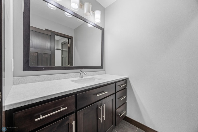3702 Houkom Dr E, Fargo, ND 58078 - bathroom featuring vanity and baseboards