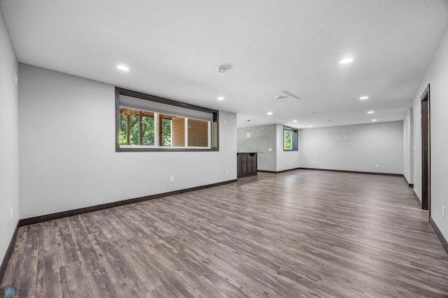 3702 Houkom Dr E, Fargo, ND 58078 - unfurnished living room with recessed lighting and wood finished floors
