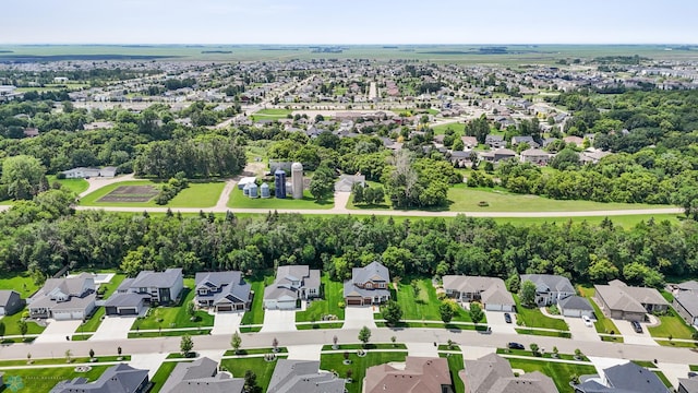 3702 Houkom Dr E, Fargo, ND 58078 - aerial view of residential area with a tree filled landscape
