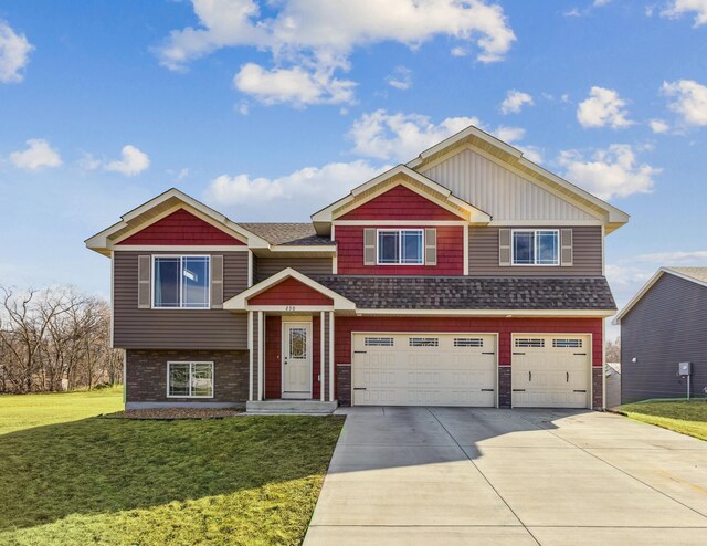 230 Newspaper Run NE, Kimball, MN 55353 - view of front of house with a garage, driveway, a front lawn, and a shingled roof