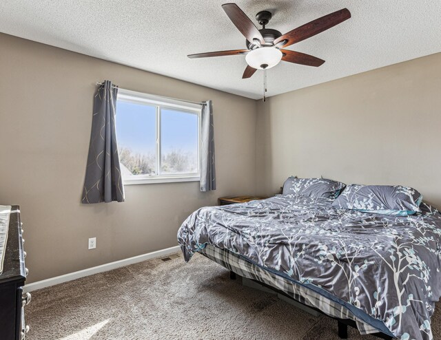 230 Newspaper Run NE, Kimball, MN 55353 - carpeted bedroom with a textured ceiling and ceiling fan