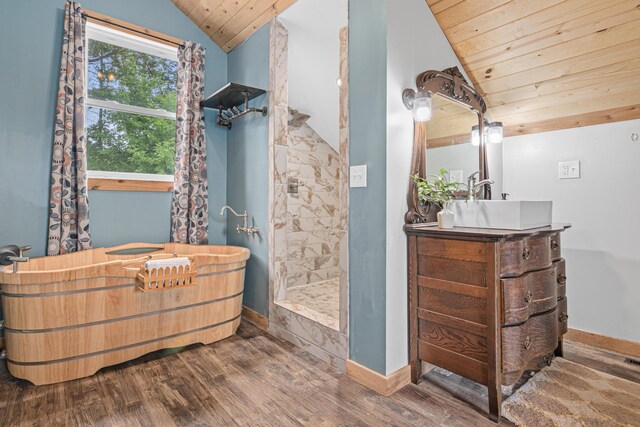 2565 Highland Rd, Minnetrista, MN 55359 - bathroom with vaulted ceiling, wooden ceiling, wood finished floors, vanity, and a tile shower