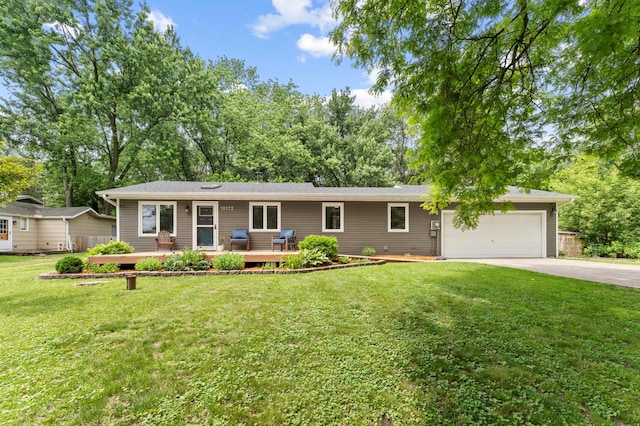 19172 Front Blvd NE, East Bethel, MN 55092 - ranch-style home featuring an attached garage, concrete driveway, a front yard, and a deck