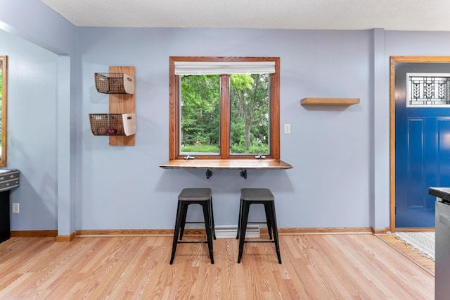 19172 Front Blvd NE, East Bethel, MN 55092 - dining area featuring wood finished floors